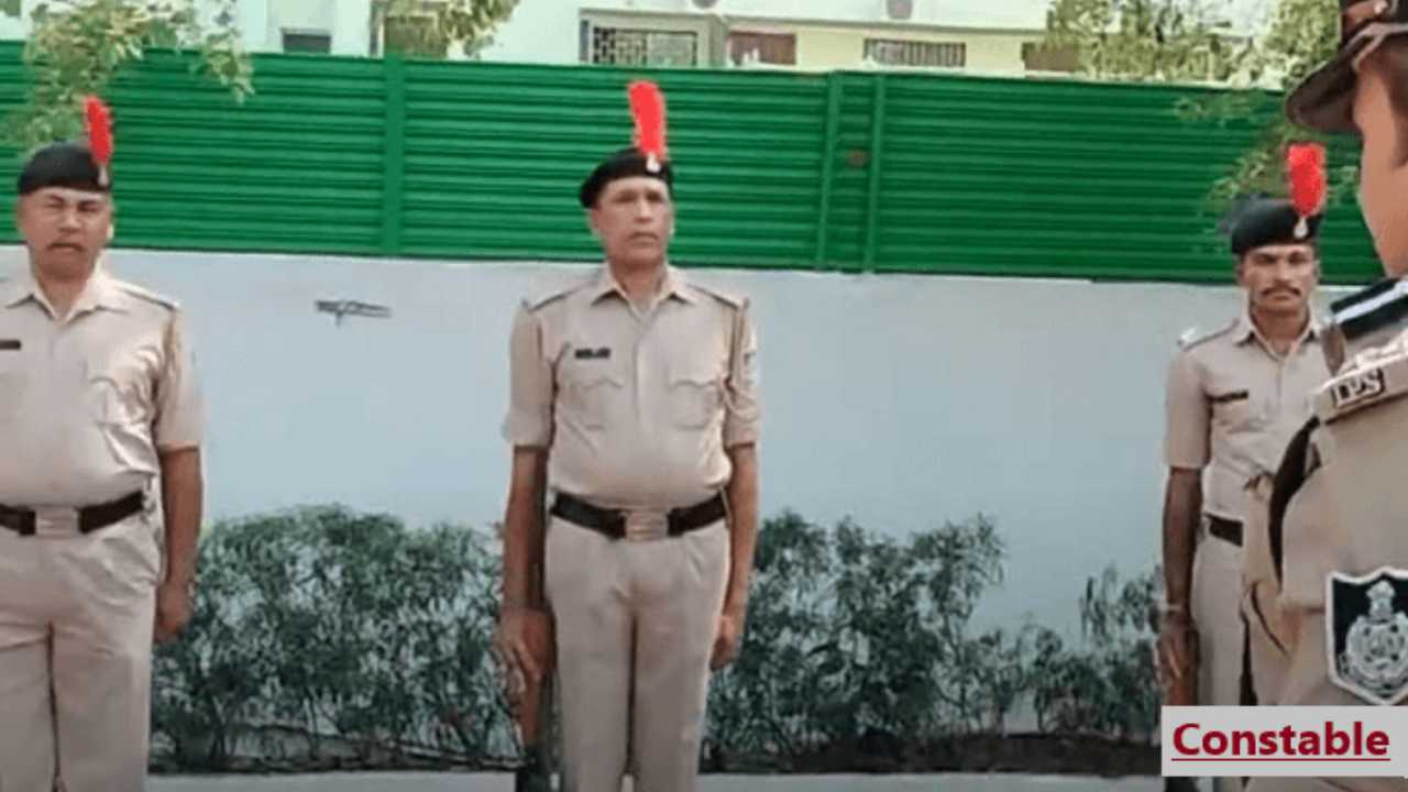 Three constable in front of senior police officer