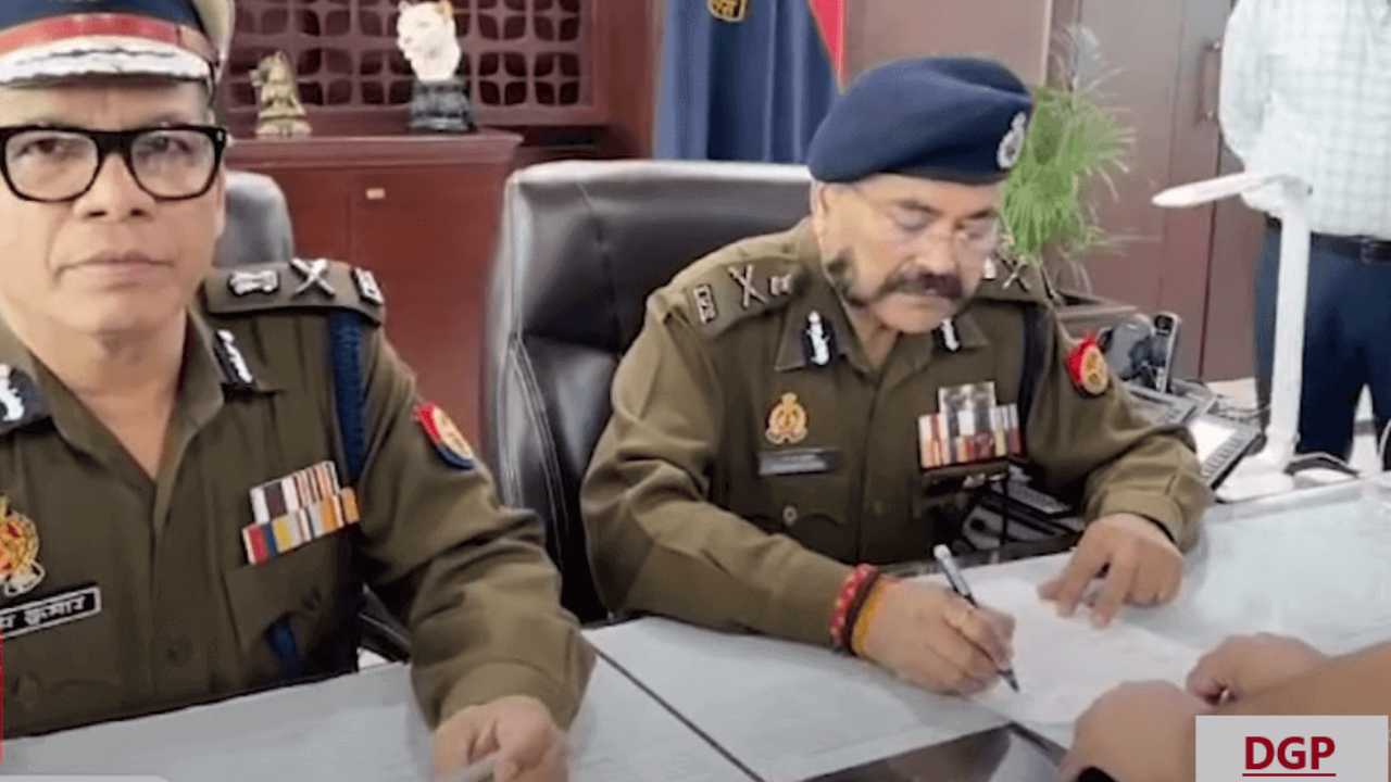 DGP officer on their chair signing on a file